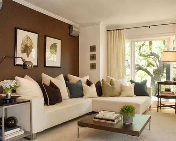 decoração de sala de estar com paleta de cores terrosas